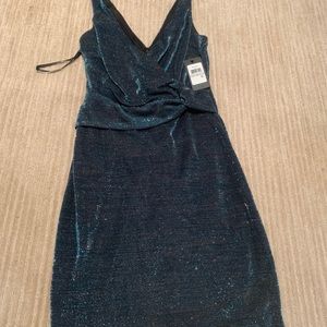 Cocktail party dress! Hits just above the knees!